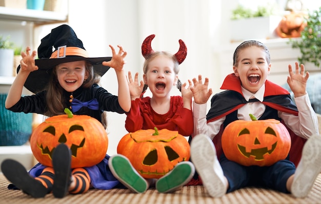 Kids with carving pumpkin