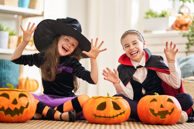 Kids with carving pumpkin