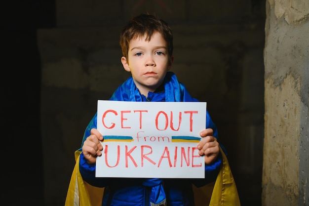 Kids with poster with banner of russia conflict military protest Child with message Stop War America stand with Ukraine