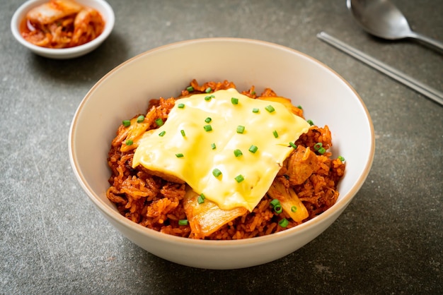 Kimchi fried rice with pork and topped cheese