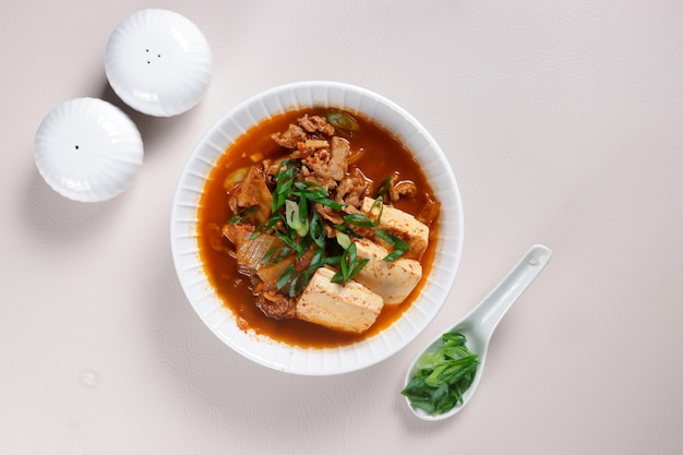 Kimchi Jjigae or Kimchi Soup is a Classic Korean Stew Made With Kimchi.