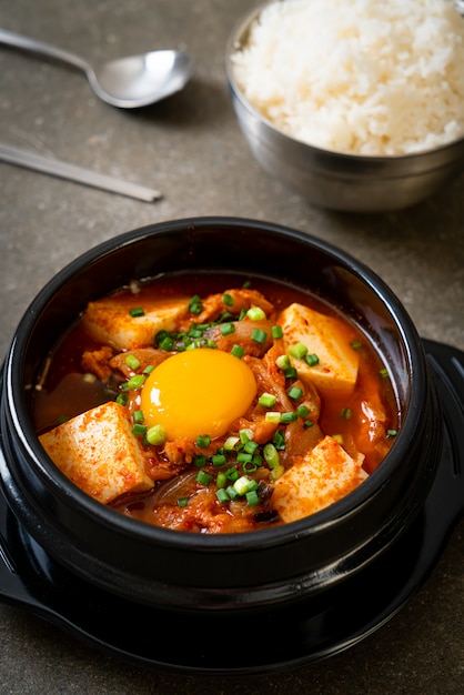 ‘Kimchi Jjigae’ or Kimchi Soup with Tofu and Egg or Korean Kimchi Stew