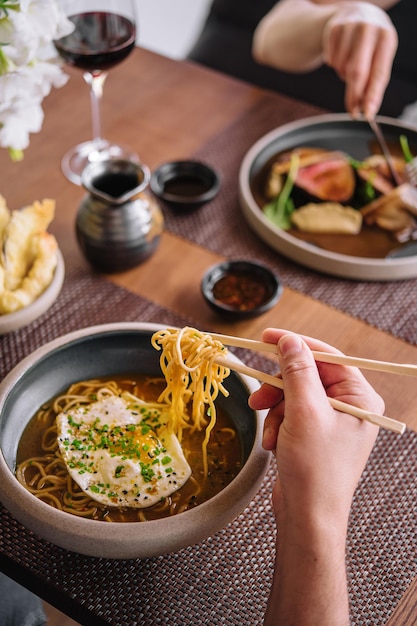 Kimchi noodle spicy soup with egg