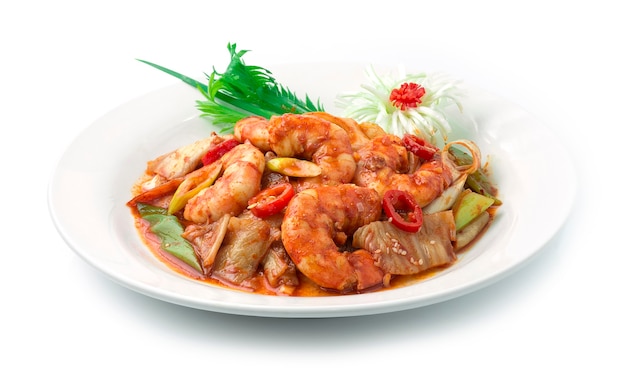 Kimchi Stir Fried with Shrimps Korean Food Style topped with Leek spring onion cutlet Decorate sesame ,carved Leek flower shape and spring onion. 