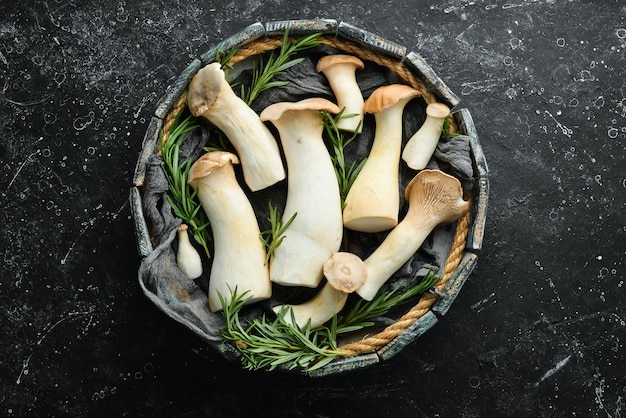 King Oyster mushroom or Eringi in a box Mushrooms Top view Organic food