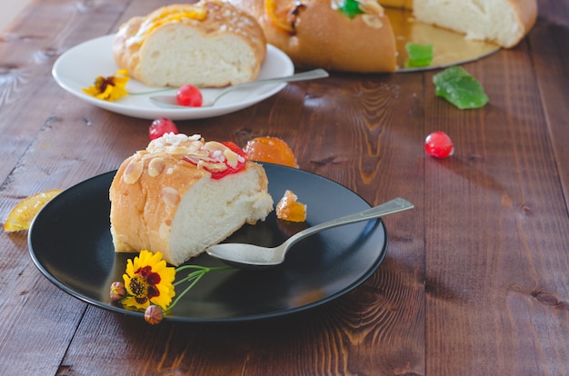 Kings day cake with pieces served on a plate.