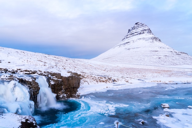 Kirkjufell Rock in the Winter oft Iceland Frozen Waterfall