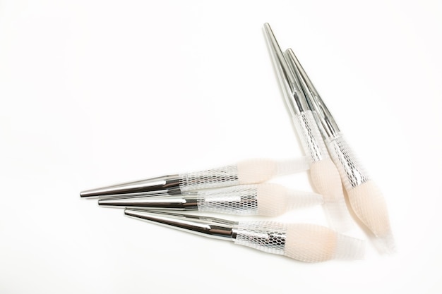 Kit of professional makeup brushes with a grid