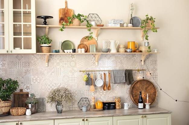 kitchen interior with wooden shelf and cozy decoration. Stylish cuisine with flowers in vase