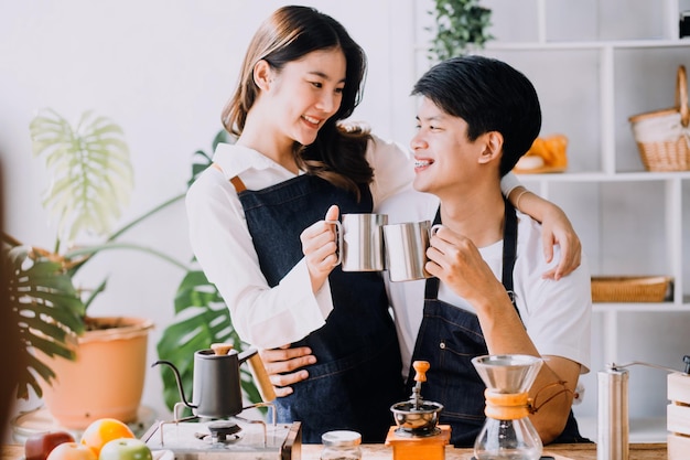 In Kitchen Perfectly Happy Couple Preparing Healthy Food Lots of Vegetables Man Juggles with Fruits Makes Her Girlfriend Laugh Lovely People in Love Have Fun