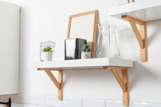 Kitchen shelves with frames and decorations