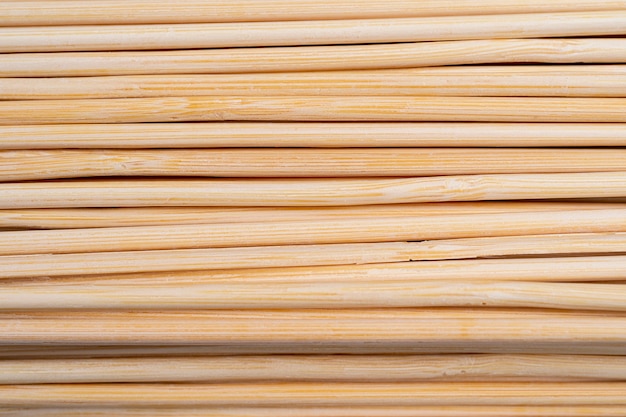 Kitchen utensils pile of wooden sticks or bamboo skewers used to hold pieces of food together