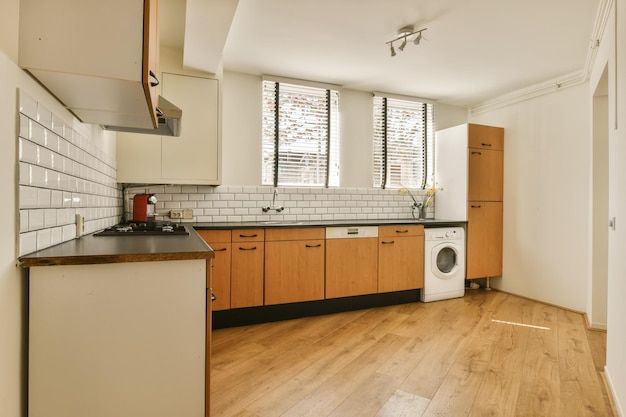 A kitchen with wooden cabinets and a white counter top