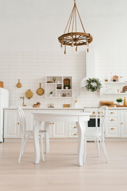 Kitchen wooden table top and kitchen blur background interior style scandinavian