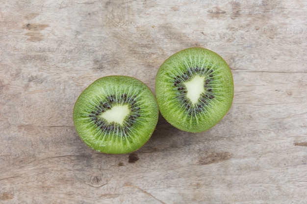 Kiwi fruit on wooden table