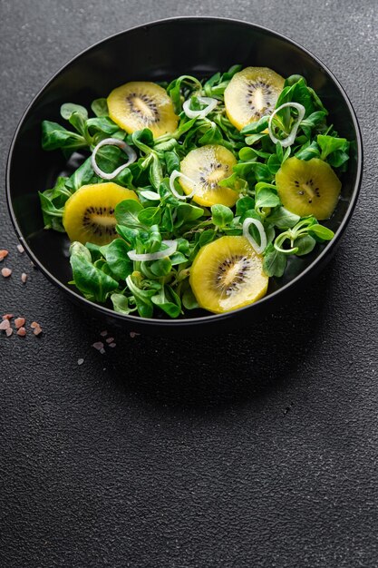 kiwi salad snack meal on the table copy space food background rustic top view