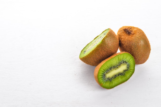 Kiwi on a wooden background Fresh fruits Top view Free space for text