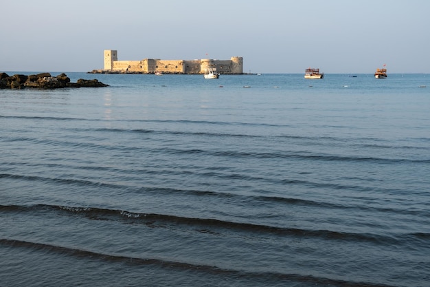 Kizkalesi or Maiden Castle near Mersin on a small island at sunrise