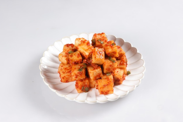 KKakdugi is Korean Radish Kimchi that's Cut into Cubes.