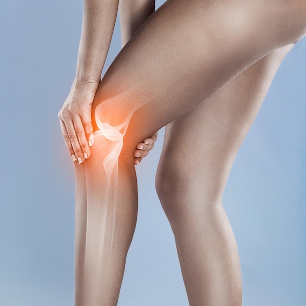 Knee injuries can linger Concept shot of a woman with a painful knee joint