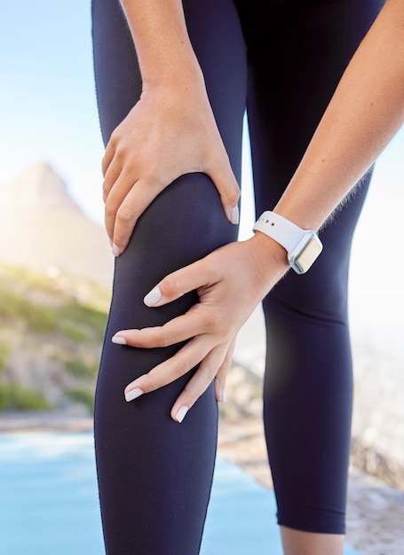 Knee pain fitness or sport woman with muscle or leg injury for exercise workout or running training in Cape Town Runner wellness and athlete with medical emergency or knee joint in health sports