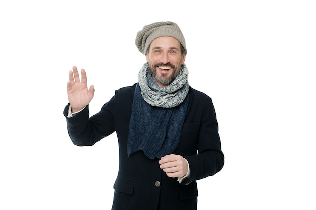 Knitted accessories. Mature man cold winter weather style. Man enjoy warmth and comfort. Casual coat for cold winter conditions. Handsome guy wearing hat and scarf white background. Winter collection.