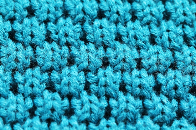 Knitted background close up of blue color