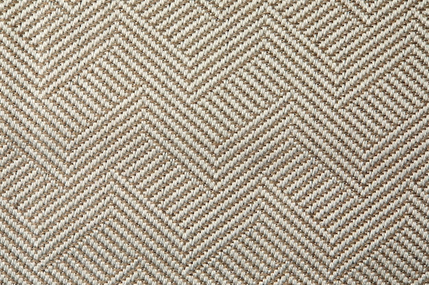 Knitted texture Texture of jacquard fabric with gray geometric pattern Crochet mosaic pattern