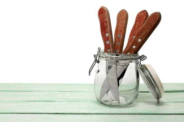 Knives in Glass Bottle