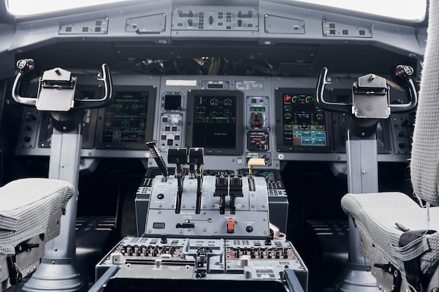 Photo knobs and buttons close up focused view of airplane cockpit