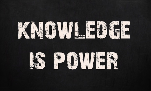 Knowledge is power written on a chalkboard.