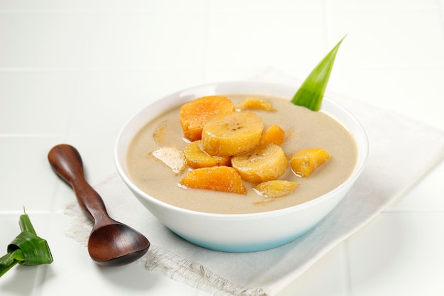 Kolak Pisang Ubi is Banana Sweet Potato Compote Popular Indonesian Dessert Made from Coconut milk Palm Sugar and Pandanus Leaves Very popular during Ramadhan