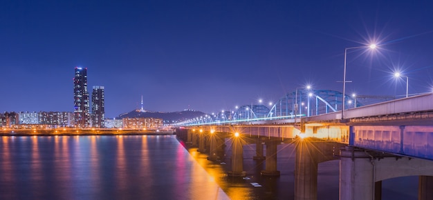 Korea landmark and bridge and Han river,n seoul tower at night,  South Korea.