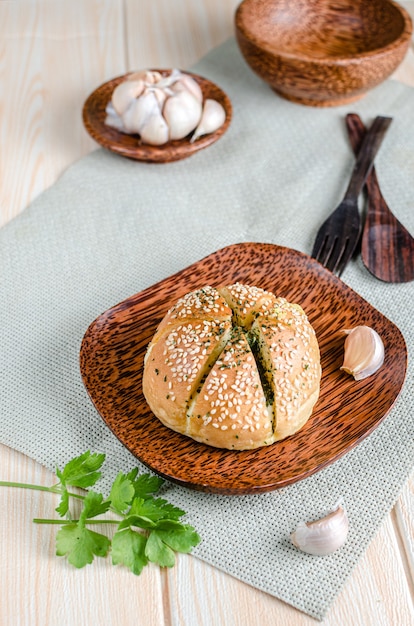 Korean Garlic Bread on Wood plate with Garlic Wood surface