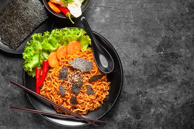 Korean hot spicy chicken flavor ramen instant noodles, stir fried noodle.