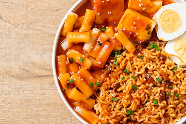 Korean instant noodles with Korean rice cake and fish cake and boiled egg - Rabokki - Korean food style