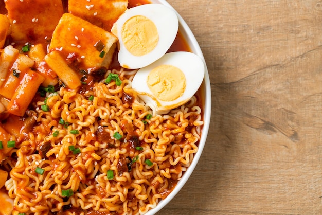 Korean instant noodles with Korean rice cake and fish cake and boiled egg - Rabokki - Korean food style