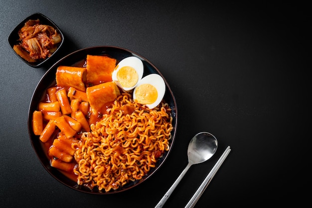 Korean instant noodles with Korean rice cake and fish cake and boiled egg