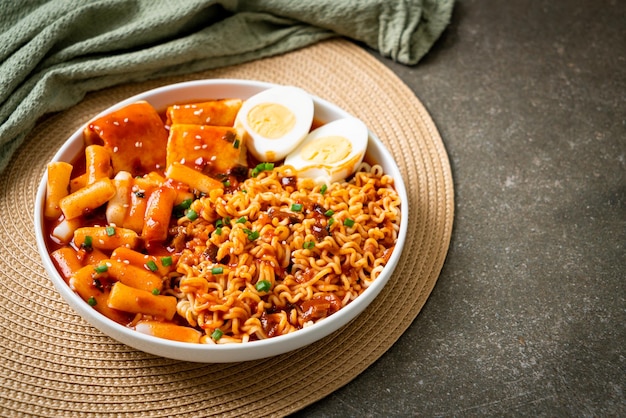 Korean instant noodles with Korean rice cake and fish cake and boiled egg