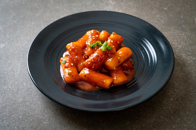 Korean rice cake stick in spicy sauce Tteokbokki