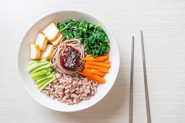 Korean spicy cold noodles called bibim makguksu