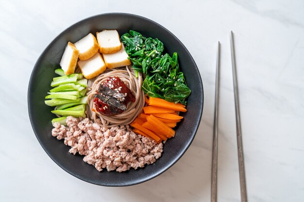 Korean spicy cold noodles called bibim makguksu