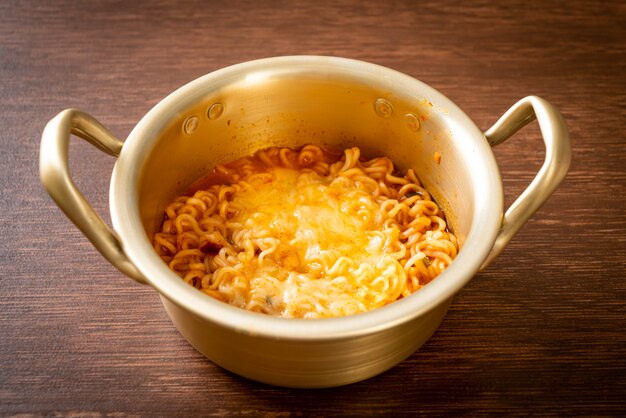 Korean spicy instant noodle bowl with mozzarella cheese