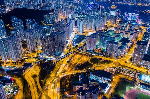 Kowloon Bay, Hong Kong 25 April 2019: Drone fly over Hong Kong city at night