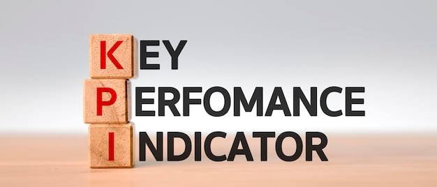 KPI text on wood box .business analysis.performance of strategy