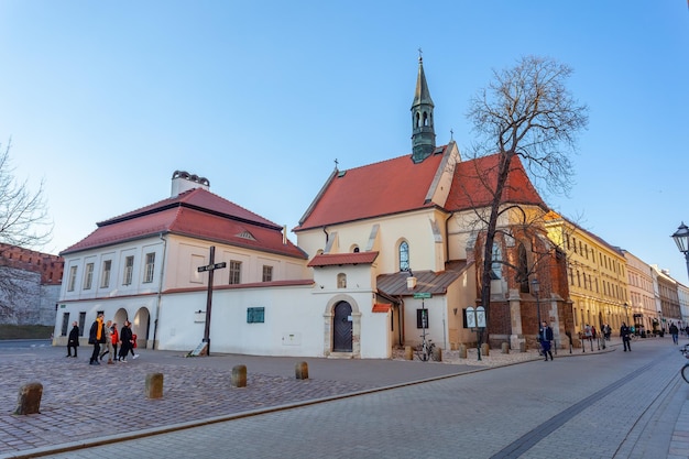 Krakow Poland 14 March 2022 A cross on the square in front of the Church of St Giles in memory of the Polish victims in Katyn in 1940