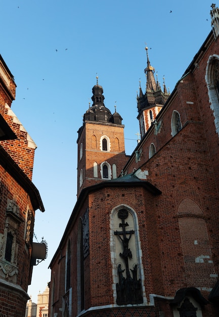 Krakow, Poland - 27 Jul, 2013: Beautiful architecture of old Krakow. City square in Krakow