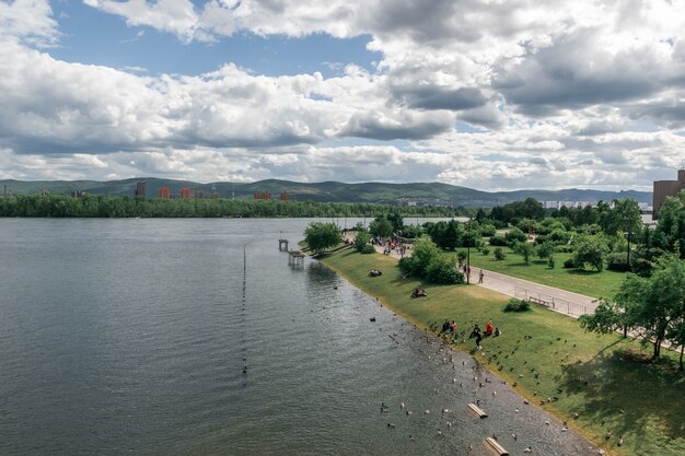 Krasnoyarsk, Russia - July 12, 2021: View of the flooded embankment