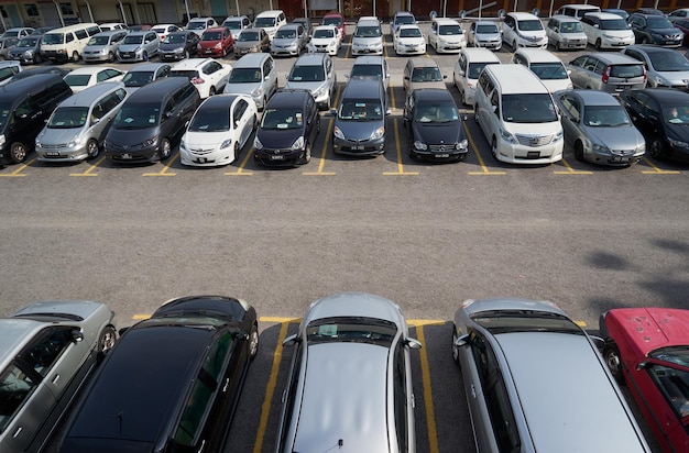 Kuala Lumpur MALAYSIA 09 OCTOBER Rows of the number of cars parked in a public parking lots in the holidays Wilayah Persekutuan Kuala Lumpur 2016