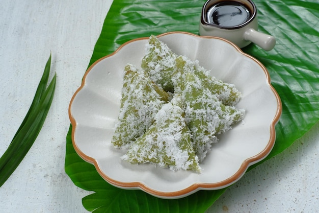 kue lupis Indonesian Traditional Snack Made From Sticky Rice, Wrapped with Banana Leaf,